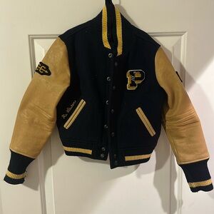 Ralph Lauren Polo varsity jacket with leather sleeves.